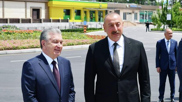 Президент Азербайджана Ильхам Алиев и Президент Узбекистана Шавкат Мирзиёев - Sputnik Азербайджан